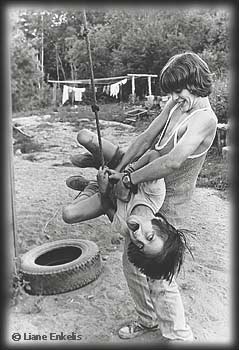 Boys with tire swing